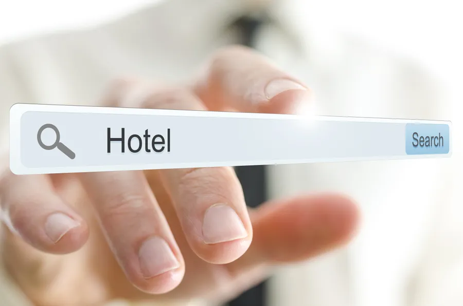 Google search bar displaying 'hotel', representing online search for accommodation options.